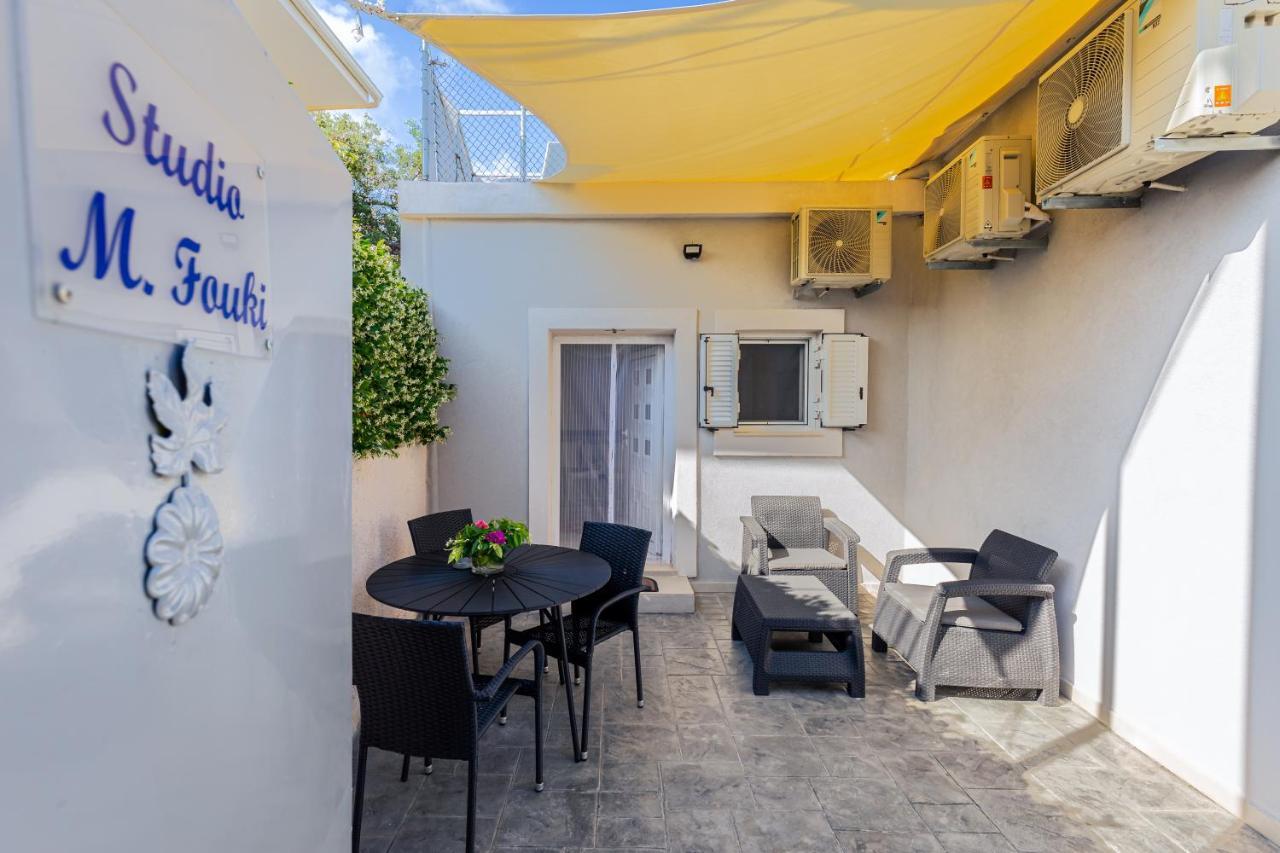 Fouki Apartments Ipsos Beach Bagian luar foto