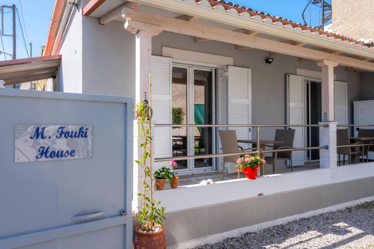 Fouki Apartments Ipsos Beach Bagian luar foto